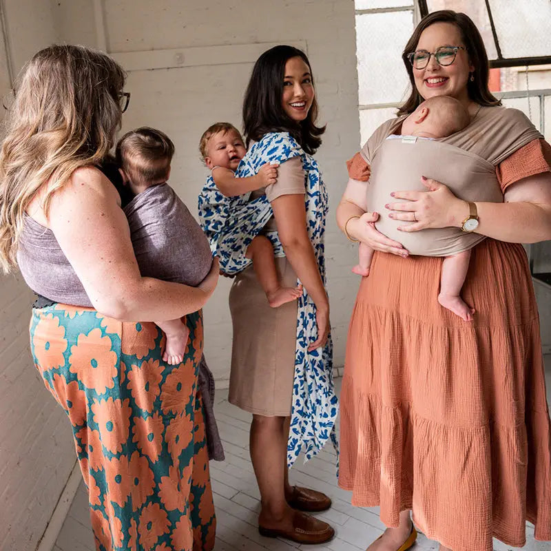 Women babywearing hope&plum carriers