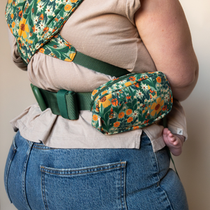 A product shot of a hope&plum Lark pocket and matching Lark on a mid size white woman facing away from the camera.