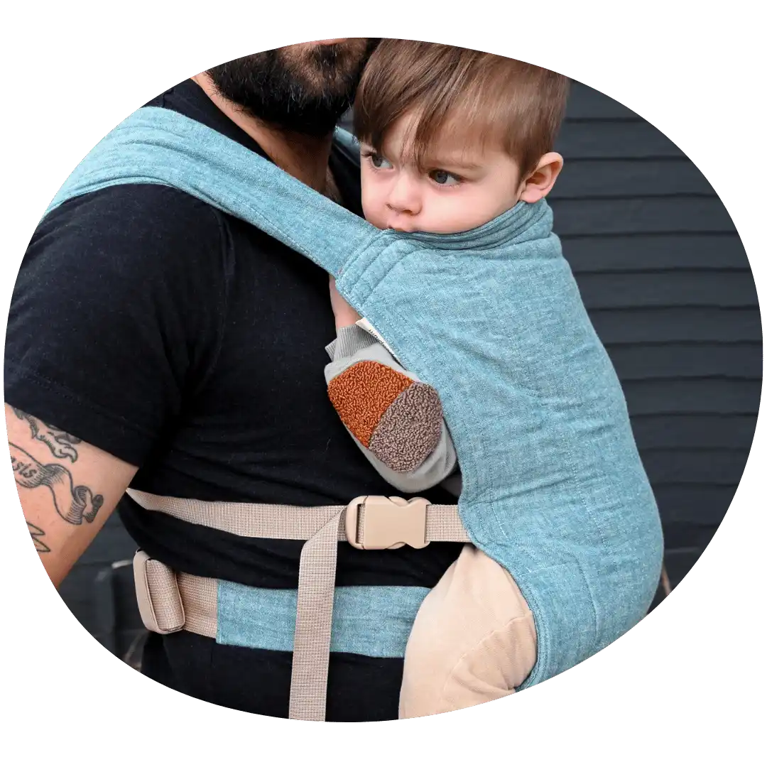 Baby carrier with a child.
