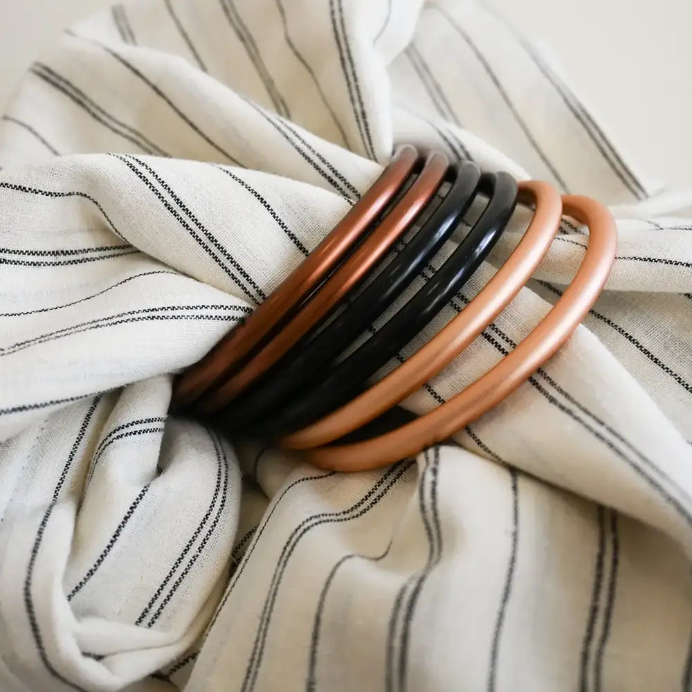 Close up of black and white stripe baby sling.