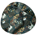 Image of close up of ring sling fabric featuring a village scene printed.