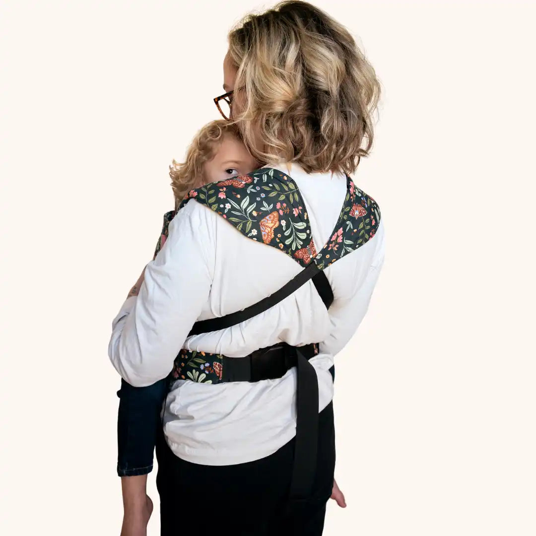 Floral baby carrier.