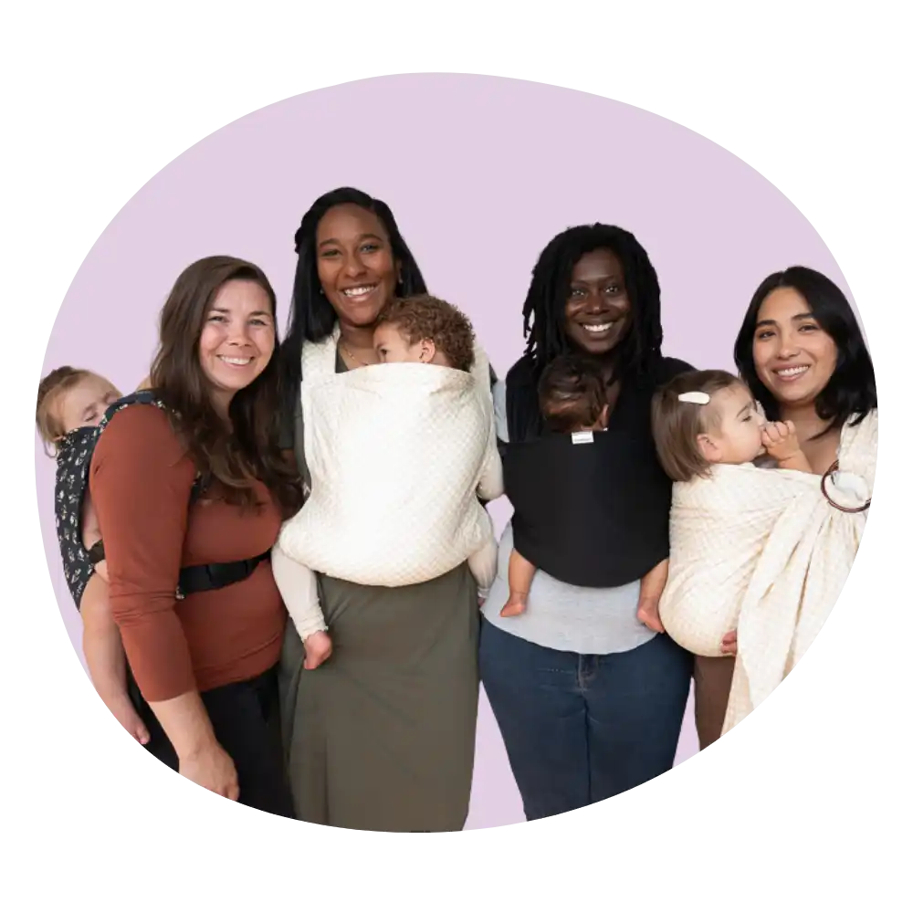 Group of women babywearing.