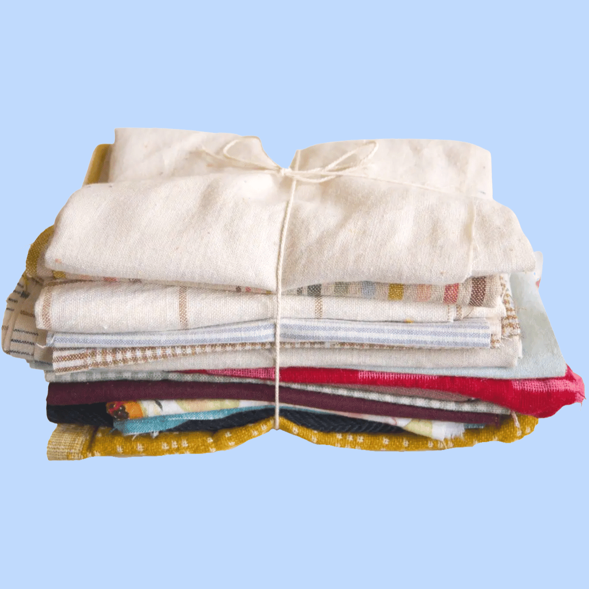 A tied-up scrap bundle  on a blue background