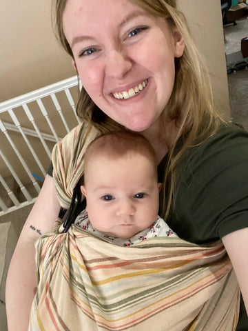 Doula babywearing kangaroo carry