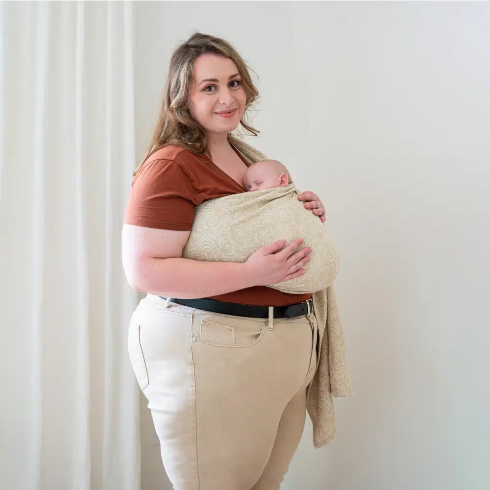 Plus-size mom wearing her baby in a Cider Ring Sling - baby carrier hope&plum