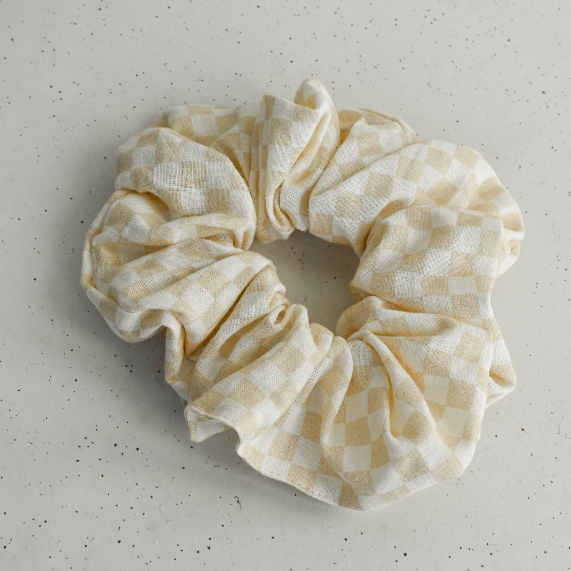 Checkered scrunchie on a white background