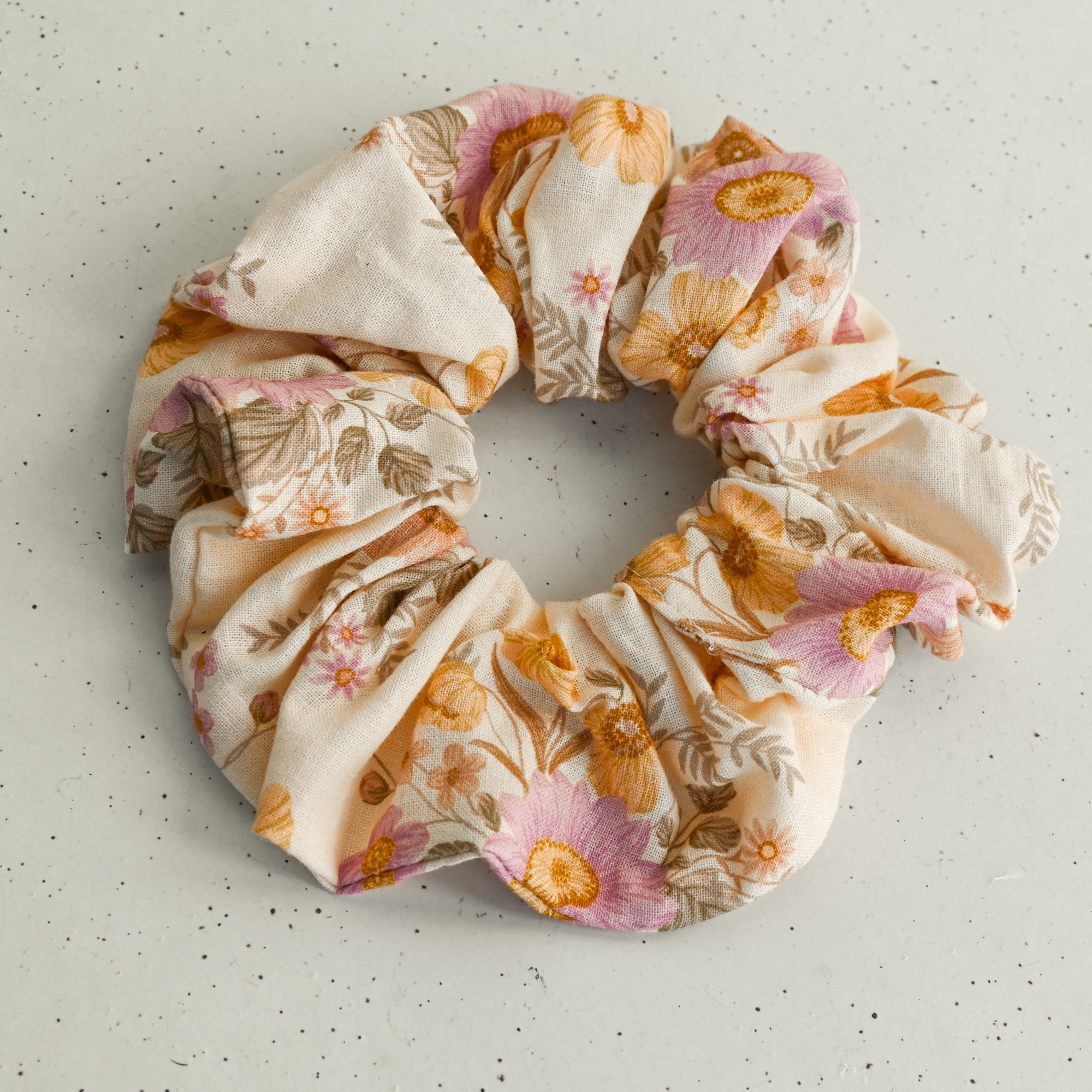 Floral patterned scrunchie on a white background
