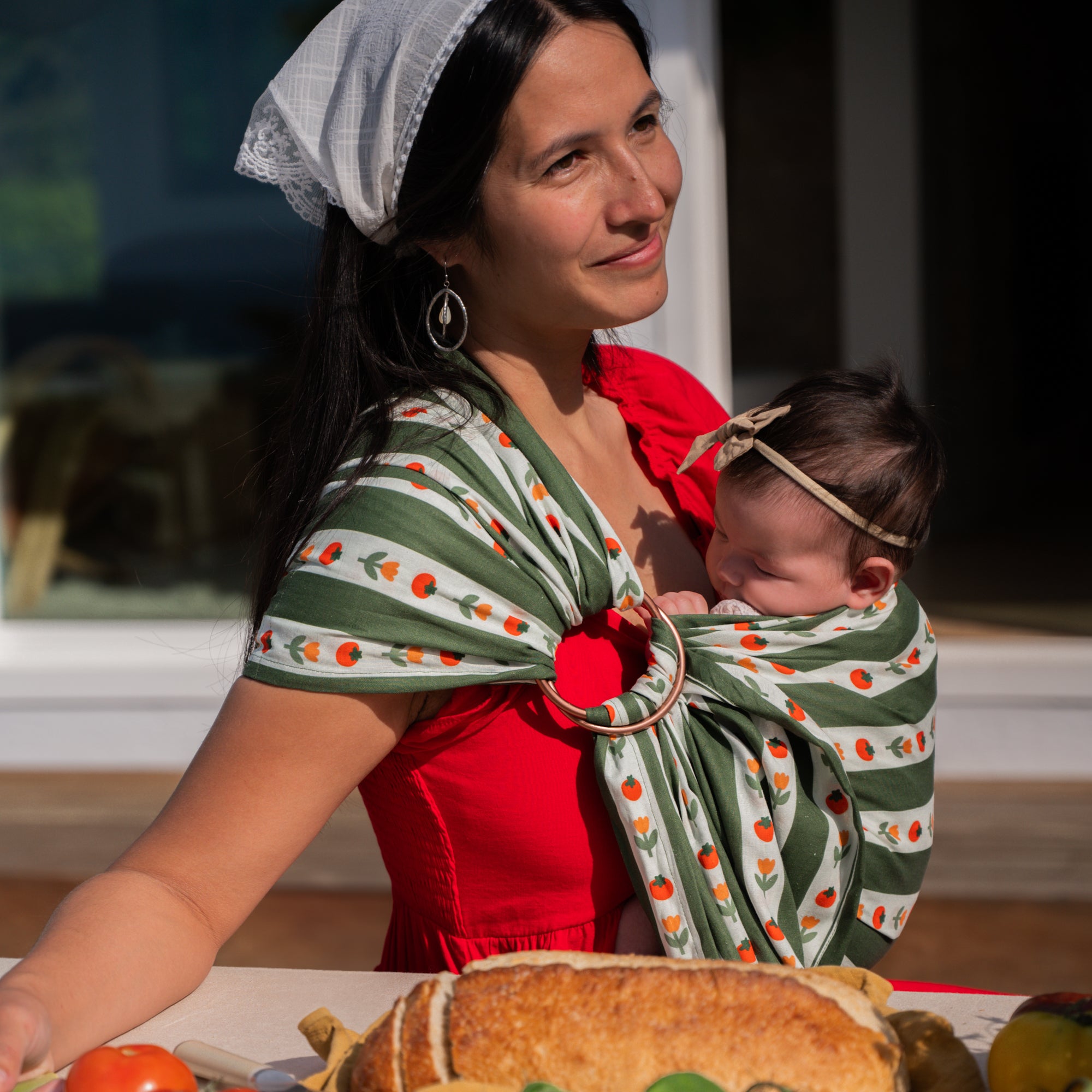 hope&plum Medley ring sling deep green stripe tomato and floral print front carry baby