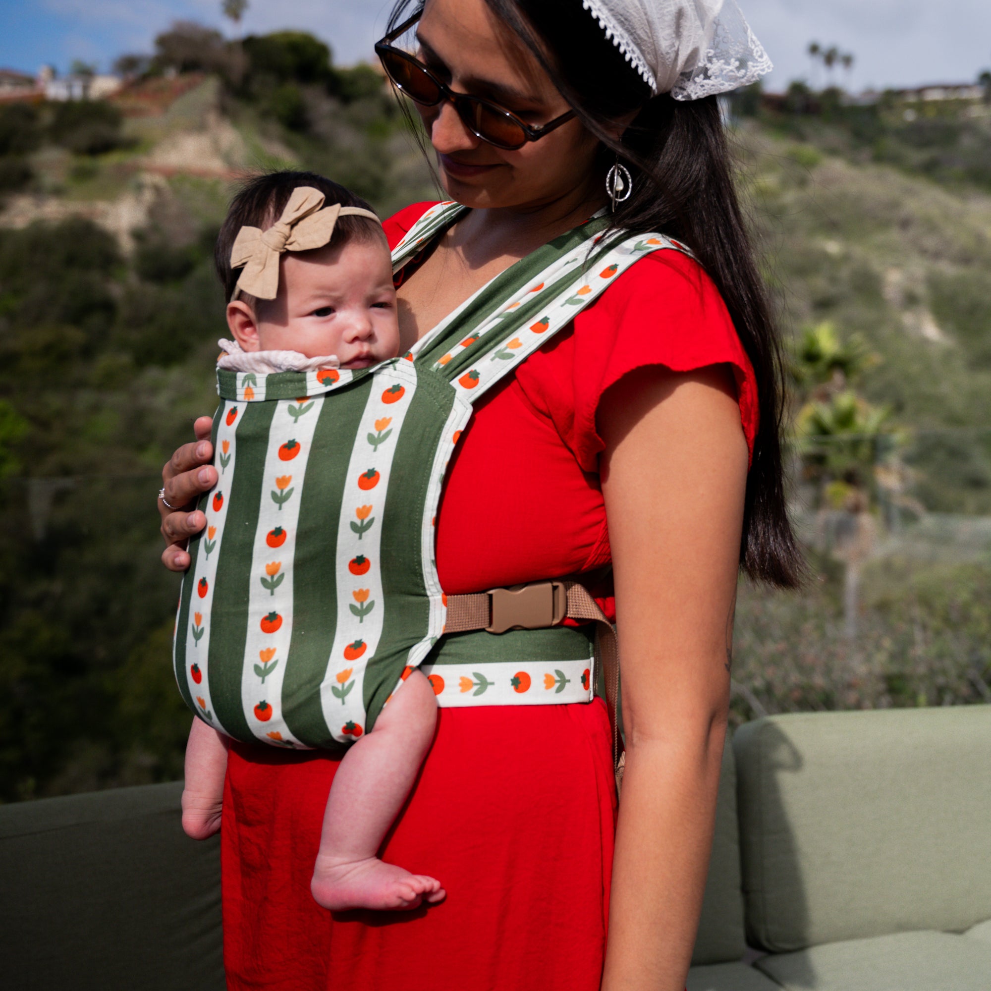 Medley - Sprout Baby Carrier - hope&plum carriers - green and white striped carrier with tomatoes and tulips on the white stripe