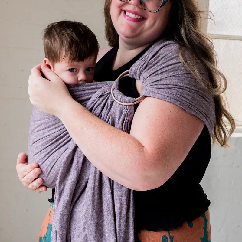 Parent wearing the Huckleberry Ring Sling